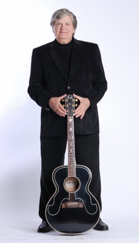Phil Everly with his guitar